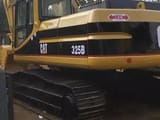 2006 Caterpillar 325B crawler excavator, rear three-quarter view