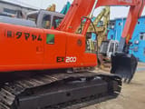 Hitachi EX200 crawler excavator side view
