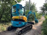 2022 Kubota U35 mini excavator, rear three-quarter view