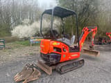 2022 Kubota KX015-4 mini excavator, rear three-quarter view