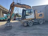 2019 Liebherr LH22 material handler, side view