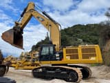 2012 Caterpillar 390D LME crawler excavator, side profile view