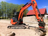 2020 Kubota KX057-4 mini excavator side view