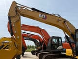 Caterpillar 320GC crawler excavator, side view of boom and cab