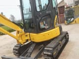 2024 Komatsu PC35 mini excavator, front three-quarter view