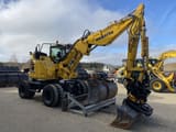 2019 Komatsu PW118MR-11 wheel excavator, side profile view