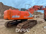 2003 Kobelco E305 crawler excavator, rear three-quarter view