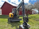 2024 Volvo ECR40F mini excavator, front three-quarter view