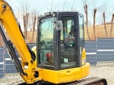 2019 Caterpillar 305.5E mini excavator cab and boom view