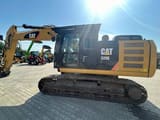 2014 Caterpillar 320EL crawler excavator, side view