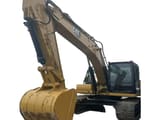 2021 Caterpillar 320GC crawler excavator, front three-quarter view