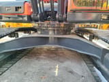 Doosan DX340 crawler excavator undercarriage view