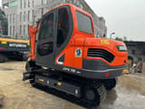 2022 Doosan DX75-9C crawler excavator, rear three-quarter view