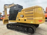 2023 Caterpillar 320GC crawler excavator, rear three-quarter view
