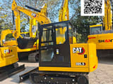 2026 Caterpillar 305.5 mini excavator, side view