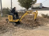 2016 Komatsu PC18MR crawler excavator side view