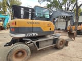 2016 Volvo LG670BM wheel excavator, rear three-quarter view