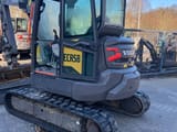 2023 Volvo ECR58F mini excavator, rear three-quarter view