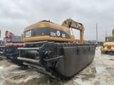 2021 Caterpillar 320C amphibious excavator, rear three-quarter view