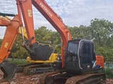 2021 Hitachi ZX120 crawler excavator, front three-quarter view