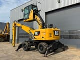2019 Caterpillar MH3024 material handler, rear three-quarter view
