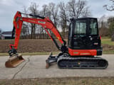 2023 Kubota KX060-5 mini excavator, side view