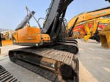 Hyundai R220LC-9S crawler excavator, rear three-quarter view