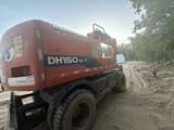 2016 Doosan DH150W-7 wheel excavator rear three-quarter view