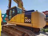 2018 Komatsu PC300-7 crawler excavator, rear three-quarter view
