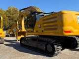 2025 Caterpillar 345 crawler excavator, rear three-quarter view