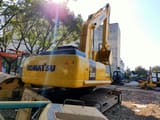 2022 Komatsu PC300-7 crawler excavator, rear three-quarter view