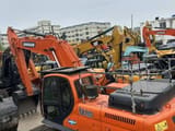 2021 Doosan DX300LC-9C crawler excavator, rear three-quarter view
