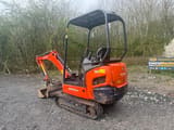 2022 Kubota KX015-4 mini excavator, rear three-quarter view