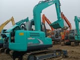 2023 Kobelco SK75-8 mini excavator, rear three-quarter view