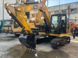 2023 Caterpillar 307 crawler excavator, front three-quarter view