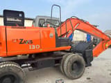 2023 Hitachi Zaxis 130 wheel excavator, side profile view