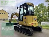 2023 Caterpillar 303.5CR mini excavator, rear three-quarter view