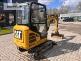 2016 Caterpillar 301.7D mini excavator, rear three-quarter view