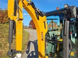 XCMG XE20E mini excavator, side view of cab and boom