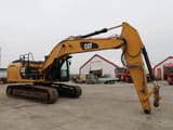 2014 Caterpillar 329E LN crawler excavator, side view