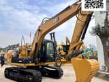 2023 Caterpillar 313D2 LGC crawler excavator, side view