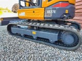 XCMG XE27E mini excavator, side view of tracks and counterweight