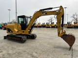 2013 Caterpillar 306 mini excavator, side view