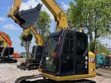 2024 Caterpillar 307E excavator, front three-quarter view