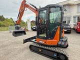 2025 Hitachi Zaxis 38U mini excavator, front three-quarter view
