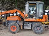 Gallmac WMW 115 wheel excavator, side view