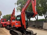 2022 Doosan DX60-9C mini excavator, front three-quarter view