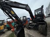 2021 Doosan DX75 wheel excavator, front three-quarter view