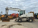 2009 Caterpillar M316D wheel excavator, side view