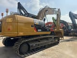 2022 Caterpillar 323D2L crawler excavator, rear three-quarter view
